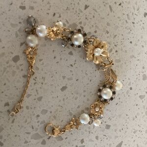 Kate spade charm bracelet  gold tone with pearl